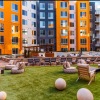 a large courtyard area with chairs and tables