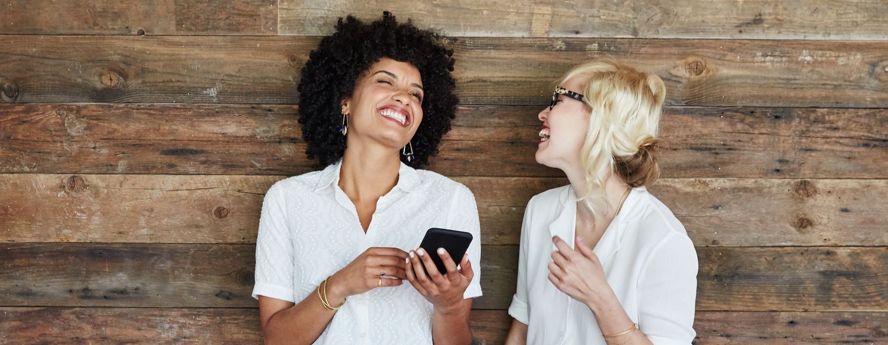 a couple of women smiling