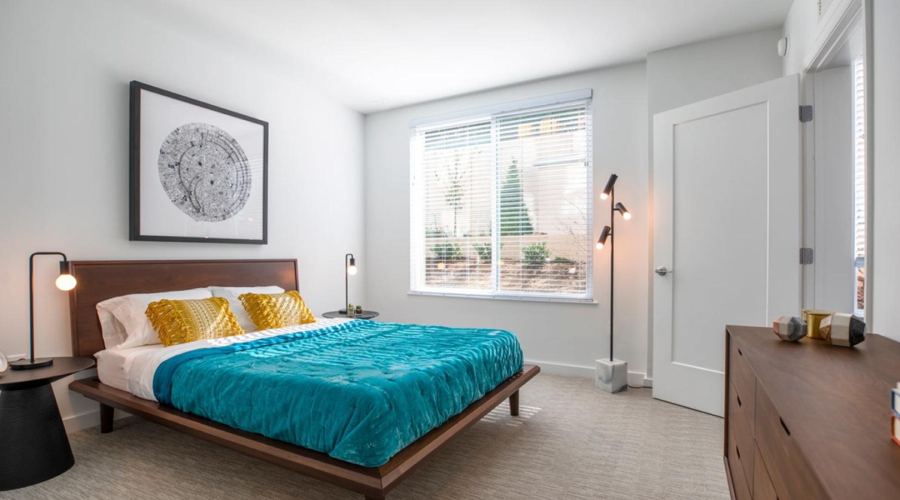 Generous bedroom offerings to fit every family a bedroom with a bed and a desk