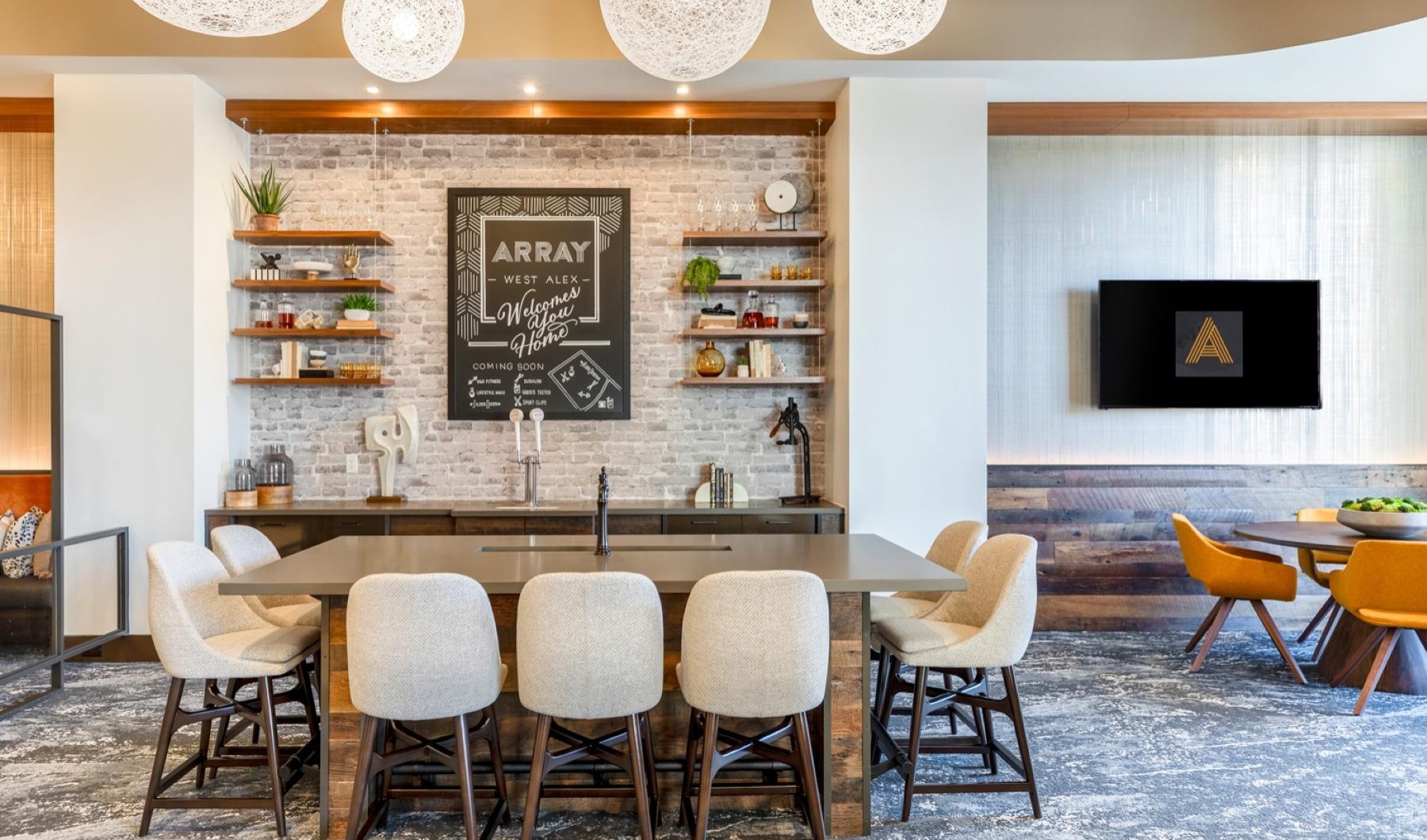 a clubhouse room with a table and chairs
