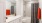 a bathroom with a shower and toilet