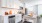 a kitchen with white cabinets