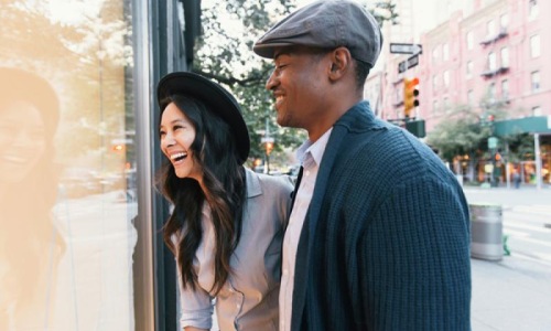 a man and woman smiling